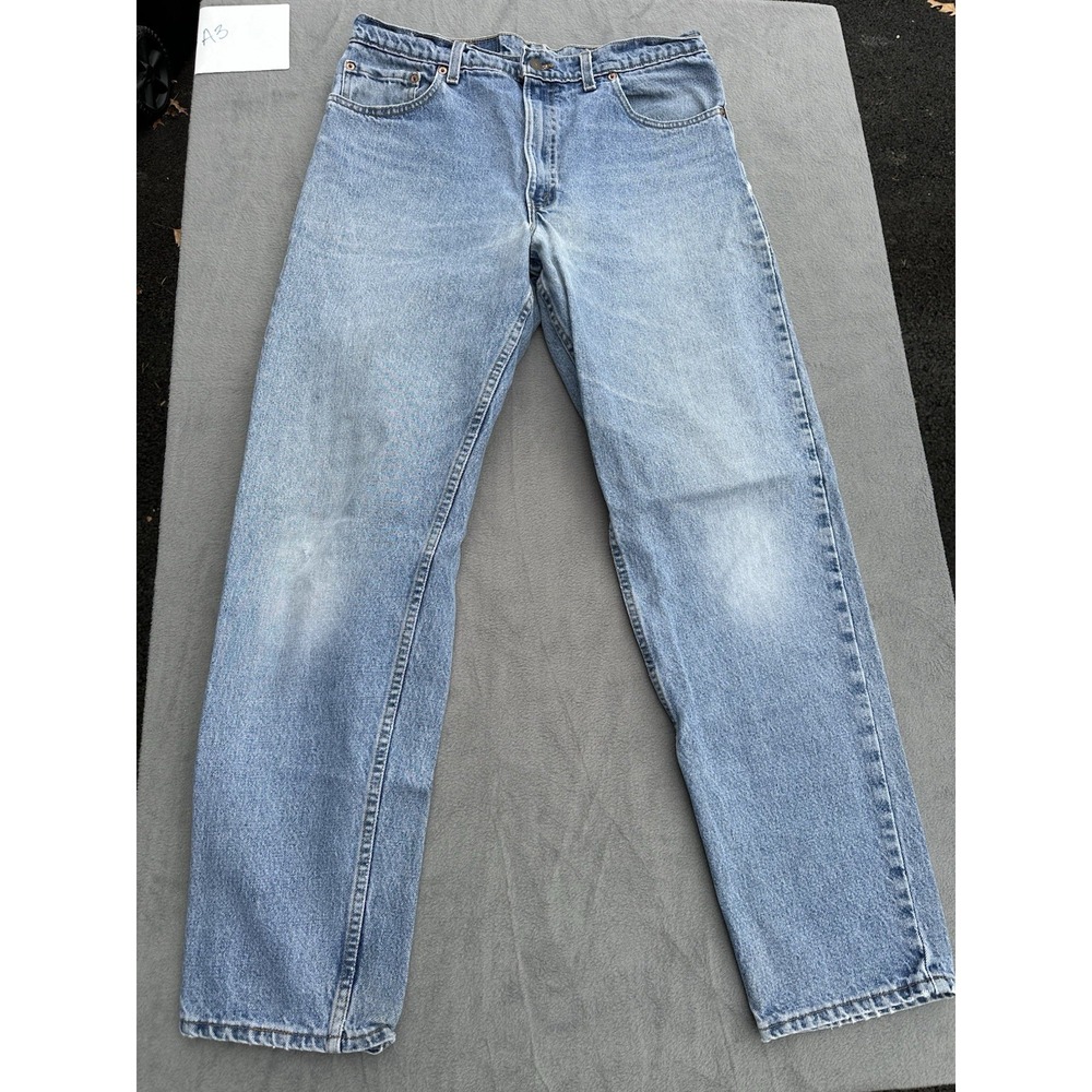 VTG 1996 Levi's 550 Men's Jeans USA Made W34 L32 Relaxed Fit Tapered Light Wash
